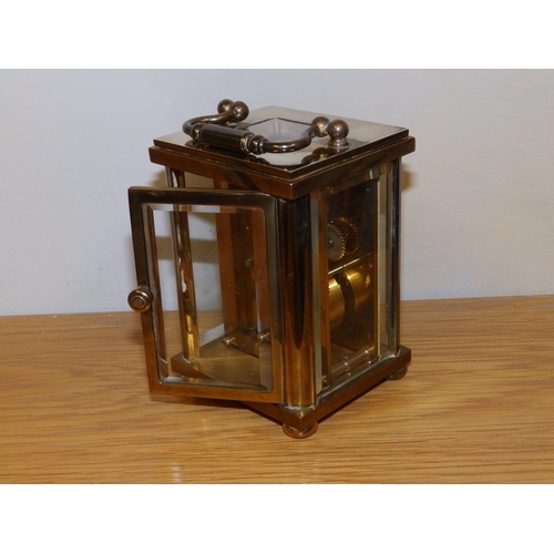 126b - A Rapport brass cased carriage clock, 4.25