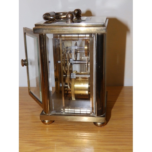 126b - A Rapport brass cased carriage clock, 4.25