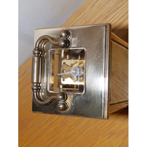 126b - A Rapport brass cased carriage clock, 4.25