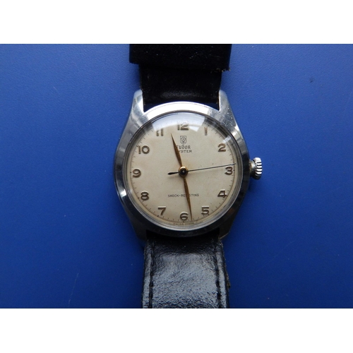 294 - A gent's stainless steel Tudor Oyster 7803 wrist watch  with cream dial,  gold arabic numerals, on r... 