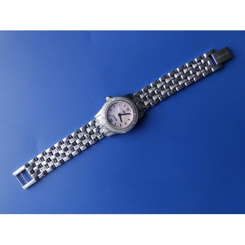 303 - A boxed lady's diamond set stainless steel Ingersoll Quartz bracelet wrist watch with mother-of-pear... 