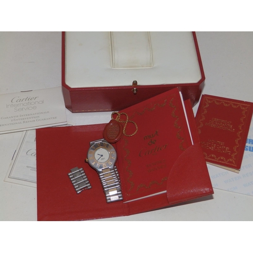 305 - A boxed  Must de Cartier Quartz stainless steel bracelet watch with half-hunter style dial, original... 