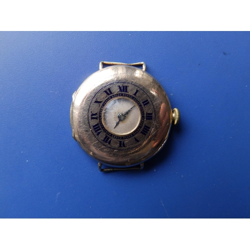 306 - An early 20thC 9ct gold half hunter wrist watch, case diameter 30mm.