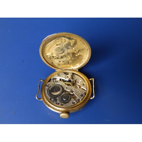 306 - An early 20thC 9ct gold half hunter wrist watch, case diameter 30mm.