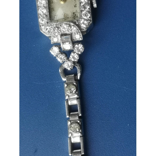 307 - A diamond set lady's cocktail wrist watch - 'Marc Fevre, Bienne', the bracelet set with pastes, havi... 