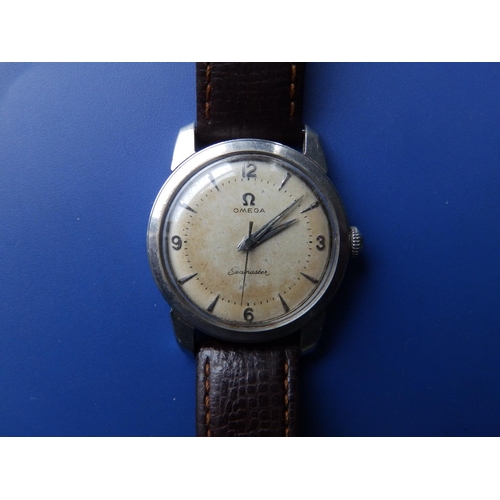 308 - A gent's stainless steel Omega Seamaster with silvered dial, centre seconds, on Omega leather strap,... 