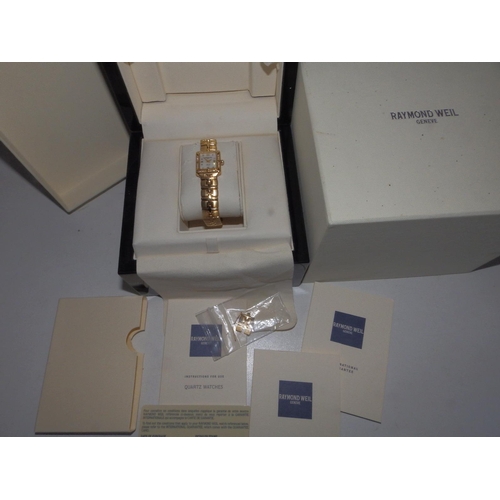 315 - A boxed,  lady's diamond set 18ct gold Raymond Weil 'Parsifal' bracelet wrist watchwrist watch with ... 