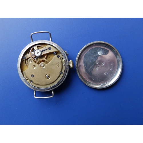 318 - An early 20thC enamelled silver wrist watch, case diameter 30mm - no strap.