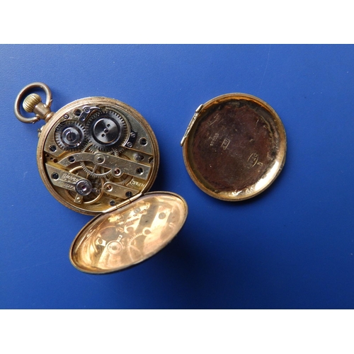 322 - A lady's 14ct gold pocket watch, case diameter 30mm - hinge broken.