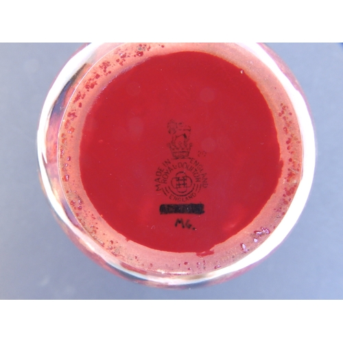 25 - A Royal Doulton flambe vase, exhibiting a range of mottled glazes - 'MG', 6.5