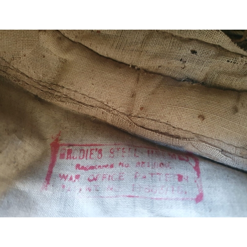 31 - An early WWI British Army 'Magnetic' Brodie helmet.