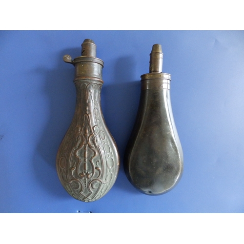 36 - A Sykes patent copper powder flask and another by Hawksley. (2)