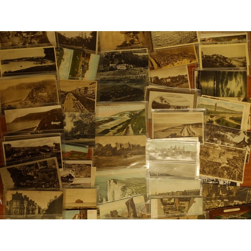 13 - A collection of approximately 300 loose postcards - some early 20thC.