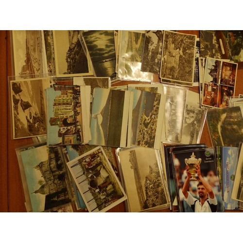 13 - A collection of approximately 300 loose postcards - some early 20thC.