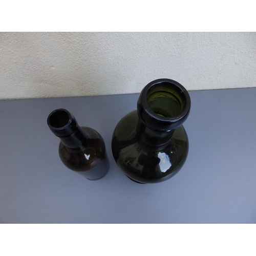 19 - An antique glass wine bottle, 11.5