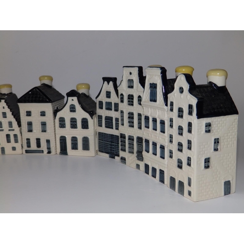 25 - 16 KLM Bols 'Delft' spirit bottles in the form of gabled houses, some with contents, 4.25