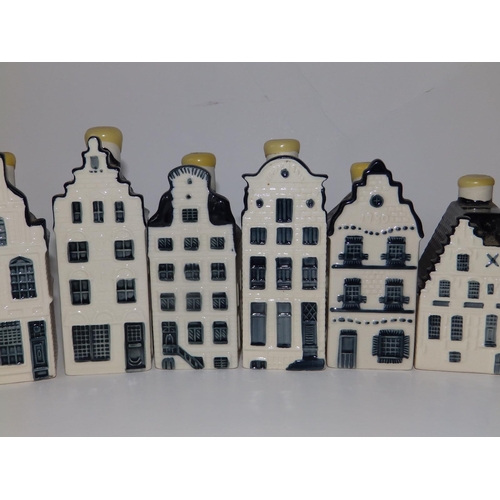 25 - 16 KLM Bols 'Delft' spirit bottles in the form of gabled houses, some with contents, 4.25