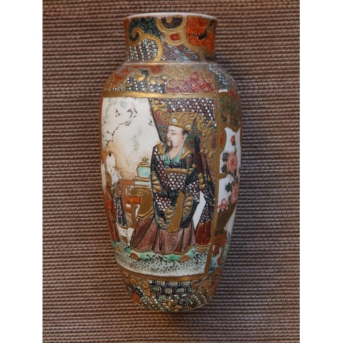 36 - A Japanese Meiji period Satsuma shouldered vase, decorated with dignitaries and attendants, indistin... 