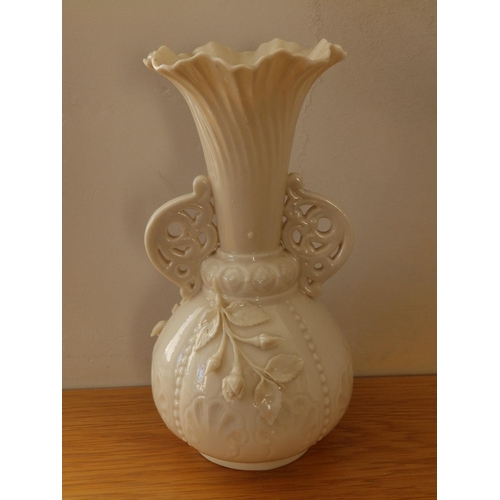 40 - A Belleek porcelain two-handled vase with black printed factory marks, 9