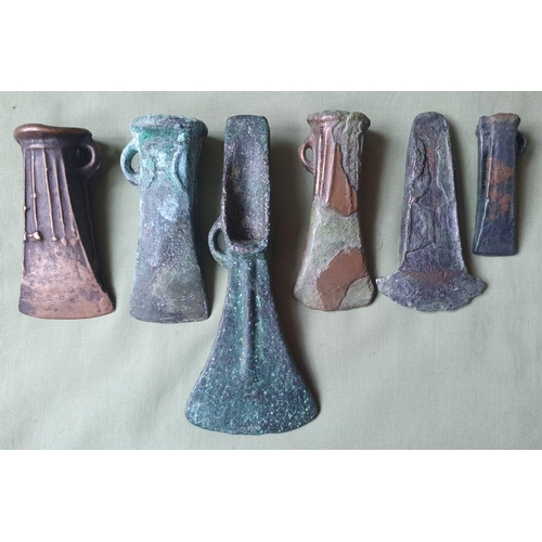 63 - A collection of UK found Bronze Age axes, the longest 6.5