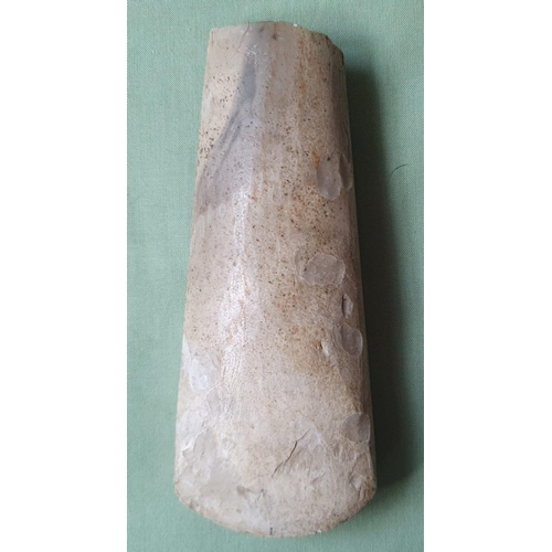 64 - A Prehistoric polished flint axe, 6