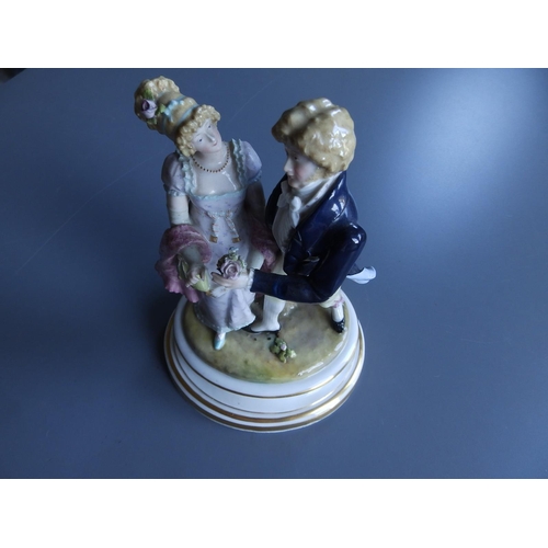 23 - A Meissen porcelain figure group - courting couple, on oval base - R163. 141, 7.5