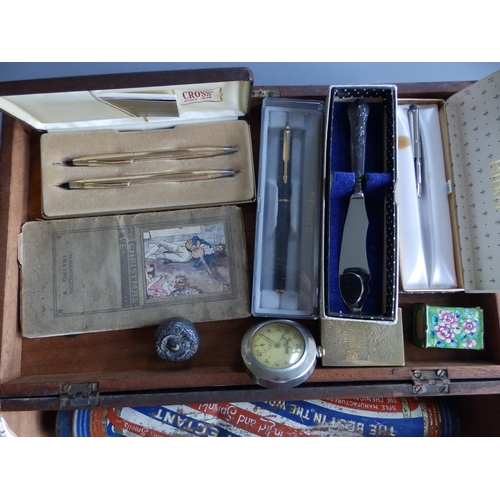 49 - A mahogany box containing modern pens, a crucifix and other collectors' items.