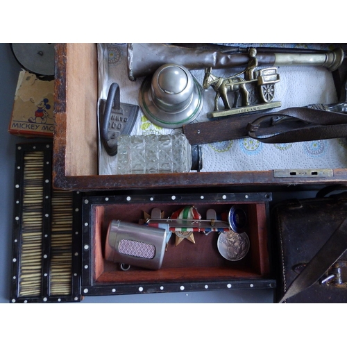 49 - A mahogany box containing modern pens, a crucifix and other collectors' items.