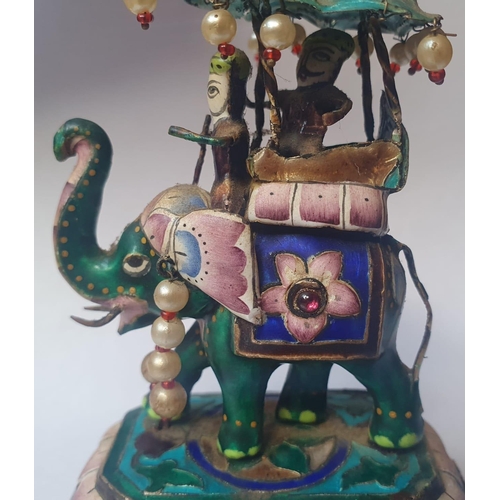 56 - A small Indian white metal & enamelled group of elephant and rider, 4