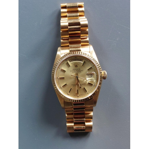 196 - A boxed 1986/87 gent's 18ct gold Rolex Oyster Perpetual Day/Date 18038 wrist watch with gold dial, b... 