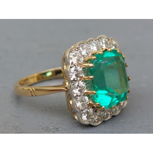 298 - A large rectangular emerald & diamond cluster ring, on yellow '18ct shank.  Finger size P/Q.