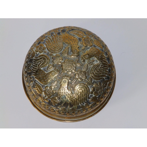 105 - An Eastern brass bowl decorated stylised script to sides, cockerels to undersides, 7.5