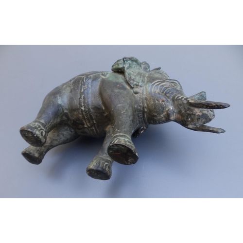 111 - An Indian bronze elephant with rider, 7.75