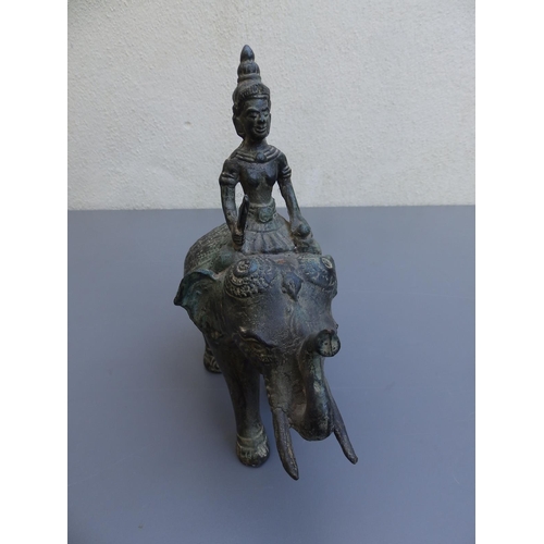 111 - An Indian bronze elephant with rider, 7.75