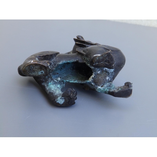 114 - A small Chinese bronze study of a shishi, 4