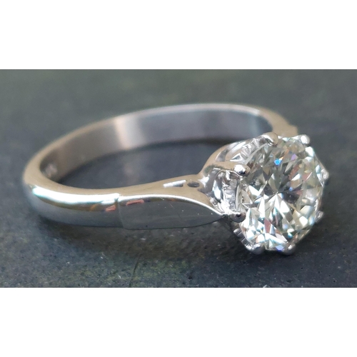 301 - A diamond solitaire ring, the claw set brilliant cut stone weighing approximately 1.65 carats, on 18... 