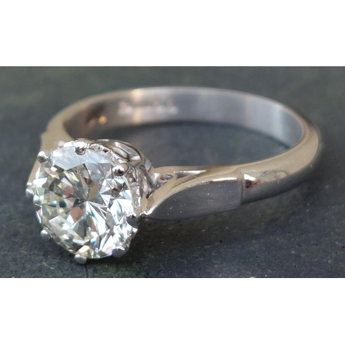 301 - A diamond solitaire ring, the claw set brilliant cut stone weighing approximately 1.65 carats, on 18... 