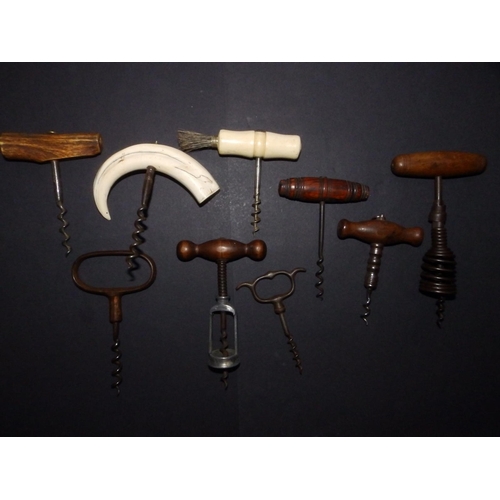 140 - Eight old corkscrews.