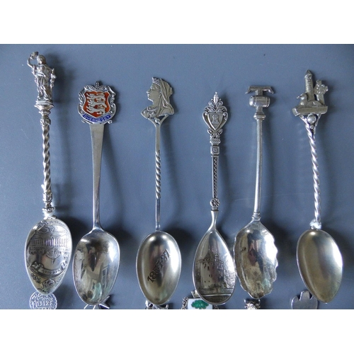 157 - 12 assorted silver teaspoons.