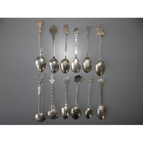 157 - 12 assorted silver teaspoons.