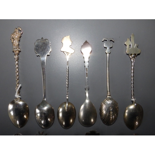 157 - 12 assorted silver teaspoons.