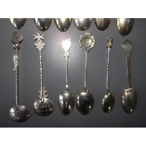 157 - 12 assorted silver teaspoons.