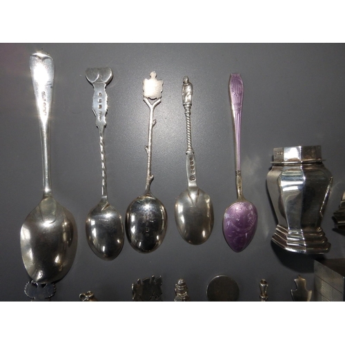 158 - A silver pepperette,  teaspoons and a silver napkin ring.