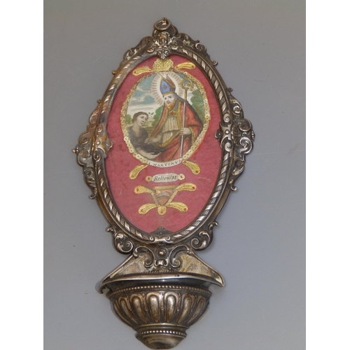 165 - A Continental 800 silver holy water font with reliquary panel dedicated to St. Martinus, having wax ... 