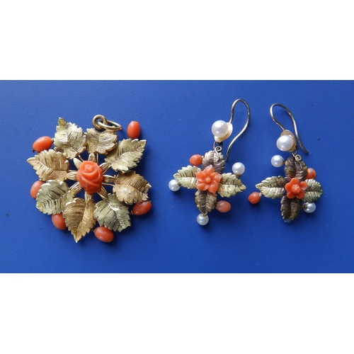 226 - A leaf cast yellow metal pendant and earrings set with coral & pearls, the pendant 1.75