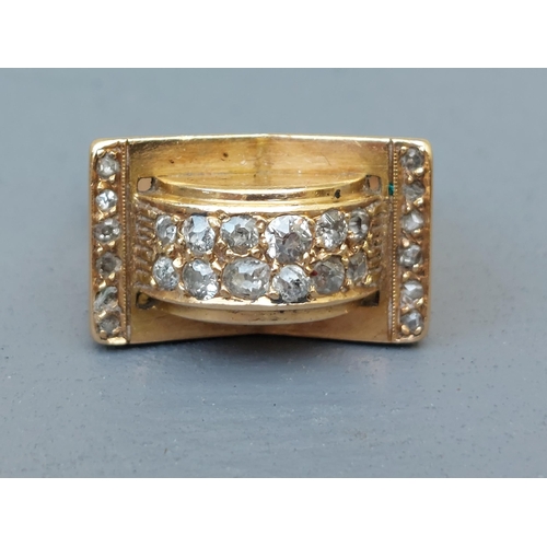 236 - An Art Deco diamond set gold  cocktail ring - unmarked.  Finger size O.