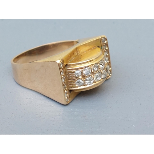 236 - An Art Deco diamond set gold  cocktail ring - unmarked.  Finger size O.