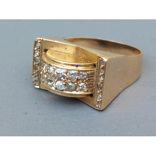 236 - An Art Deco diamond set gold  cocktail ring - unmarked.  Finger size O.