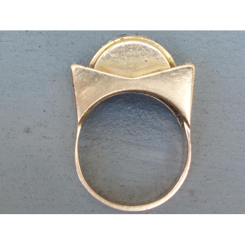 236 - An Art Deco diamond set gold  cocktail ring - unmarked.  Finger size O.