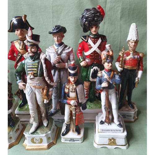 47 - A collection of military porcelain figures - some a/f.